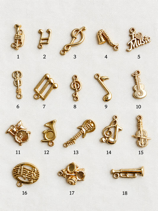 Golden sea and coastal charms numbered 1 to 18 for journal customization